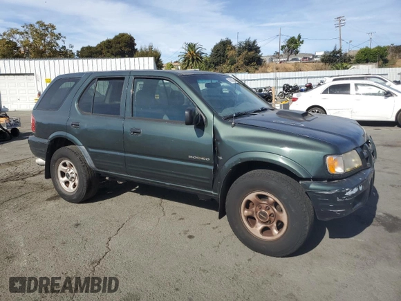 2004 Isuzu Rodeo S with VIN 4S2CK58W344303242, listed as a Copart auction lot 75339714 with 106,659 mi miles and Salvage title. Bid and sale history available at DreamBid. Image 4.