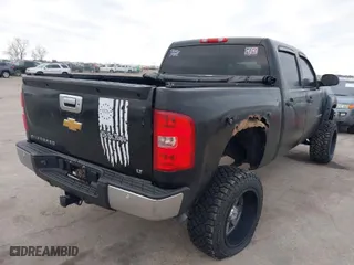 2012 Chevrolet Silverado 1500 LT with VIN 1GCPKSE72CF196471, listed as a IAAI auction lot 41294801 with 155,000 mi miles. Bid and sale history available at carsss.com. Image 4.