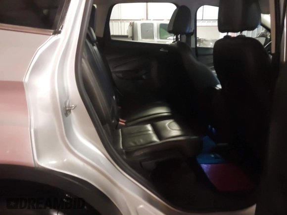 2013 Ford Escape Titanium z VIN 1FMCU0J94DUA93128, wystawiony jako IAAI lot #41612072 z przebiegiem 174 274 mil mil oraz . Historia ofert i sprzedaży dostępna na DreamBid. Obrazek 8.