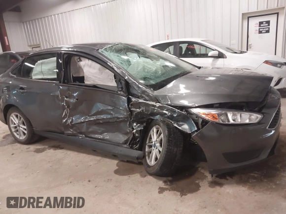 2018 Ford Focus SE with VIN 1FADP3F22JL298144, listed as a IAAI auction lot 41880555 with 73,166 mi miles. Bid and sale history available at carsss.com. Image 6.