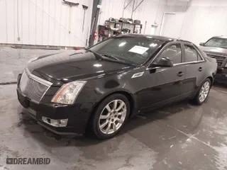 2009 Cadillac CTS AWD w/1SB with VIN 1G6DT57V490106183, listed as a IAAI auction lot 41593354 with 71,332 mi miles. Bid and sale history available at carsss.com. Image 2.