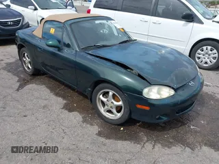 2002 Mazda MX-5 Miata Cloth z VIN JM1NB353720222073, wystawiony jako IAAI lot #42225042 z przebiegiem 94 992 mil mil oraz . Historia ofert i sprzedaży dostępna na DreamBid. Obrazek 1.