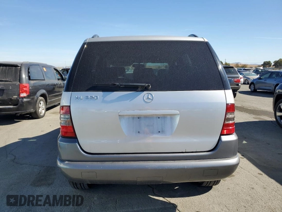 1999 Mercedes-Benz M-Class with VIN 4JGAB54E6XA117647, listed as a Copart auction lot 77284714 with 124,150 mi miles and Clean Title. Bid and sale history available at carsss.com. Image 6.