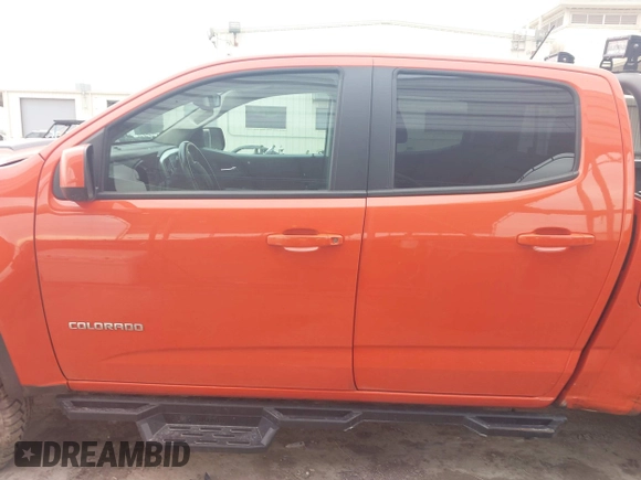 2019 Chevrolet Colorado 4WD ZR2 z VIN 1GCGTEEN9K1333740, wystawiony jako IAAI lot #41565621 z przebiegiem 71 484 mil mil oraz . Historia ofert i sprzedaży dostępna na DreamBid. Obrazek 14.