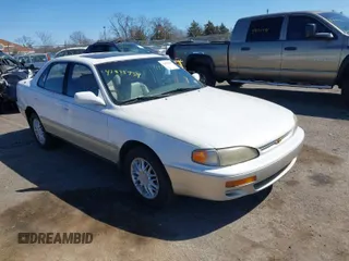 1996 Toyota Camry LE with VIN JT2BF12K2T0145887, listed as a IAAI auction lot 41823939 with 208,961 mi miles and . Bid and sale history available at DreamBid. Image 1.
