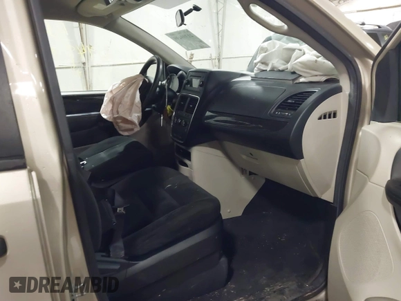 2015 Dodge Grand Caravan SE with VIN 2C4RDGBG2FR592899, listed as a IAAI auction lot 41309499 with 110,428 mi miles and . Bid and sale history available at DreamBid. Image 5.