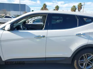 2017 Hyundai Santa Fe 2.4L z VIN 5XYZT3LB2HG383765, wystawiony jako IAAI lot #38642722 z przebiegiem 76 420 mil mil oraz . Historia ofert i sprzedaży dostępna na DreamBid. Obrazek 13.
