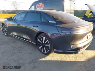 2023 Lucid Air Touring with VIN 50EA1TEA1PA002151, listed as a IAAI auction lot 41219565 with 8,215 mi miles. Bid and sale history available at carsss.com. Image 3.