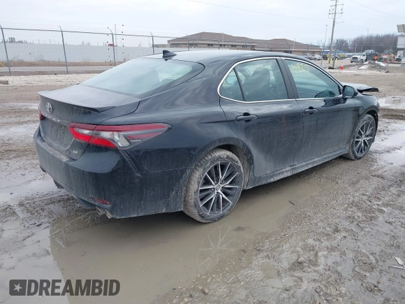 2021 Toyota Camry SE Nightshade with VIN 4T1G11AK4MU573284, listed as a IAAI auction lot 41701923 with 130,160 mi miles. Bid and sale history available at carsss.com. Image 4.