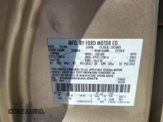 2010 Mercury Mariner with VIN 4M2CN8BG0AKJ09078, listed as a Copart auction lot 52863705 with 98,350 mi miles and Salvage title. Bid and sale history available at DreamBid. Image 14.