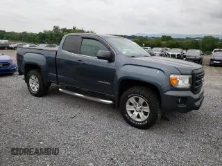 2015 GMC Canyon 2WD SLE with VIN 1GTH5BEA7F1158758, listed as a Copart auction lot 63617524 with 102,744 mi miles and Salvage Title. Bid and sale history available at carsss.com. Image 4.