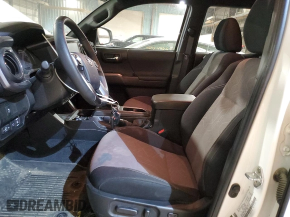 2023 Toyota Tacoma SR z VIN 3TMCZ5AN0PM651386, wystawiony jako Copart lot #51158185 z przebiegiem 23 642 mil mil oraz Szkoda całkowita • Salvage title. Historia ofert i sprzedaży dostępna na DreamBid. Obrazek 7.