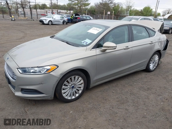 2015 Ford Fusion SE Hybrid with VIN 3FA6P0LU6FR210606, listed as a IAAI auction lot 42070466 with 123,043 mi miles and . Bid and sale history available at DreamBid. Image 18.