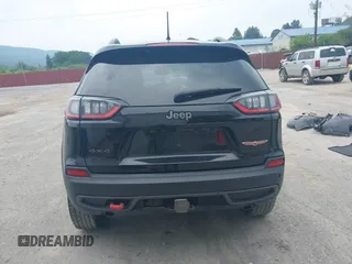 2021 Jeep Cherokee Trailhawk with VIN 1C4PJMBX0MD167941, listed as a IAAI auction lot 42507379 with 70,414 mi miles and . Bid and sale history available at DreamBid. Image 17.