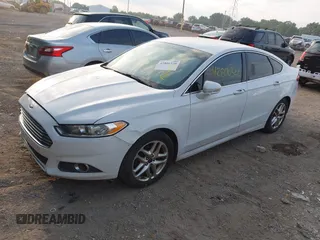 2013 Ford Fusion SE with VIN 3FA6P0HR1DR292942, listed as a IAAI auction lot 42806320 with 203,448 mi miles and . Bid and sale history available at DreamBid. Image 2.