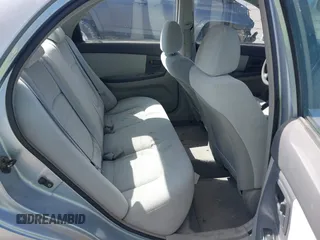 2004 Kia Spectra LX with VIN KNAFE122645052206, listed as a IAAI auction lot 41767864 with 63,866 mi miles. Bid and sale history available at carsss.com. Image 8.
