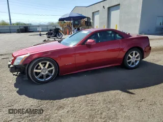 2004 Cadillac XLR z VIN 1G6YV34A345600127, wystawiony jako Copart lot #68859774 z przebiegiem 40 727 mil mil oraz Szkody całkowita. Historia ofert i sprzedaży dostępna na DreamBid. Obrazek 1.