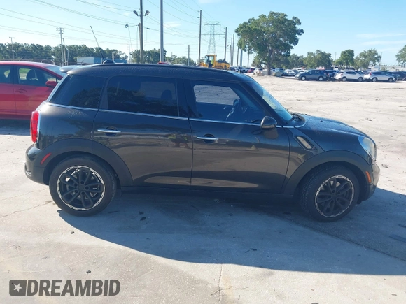 2015 MINI Countryman S with VIN WMWZC3C58FWT04316, listed as a IAAI auction lot 42525698 with 97,046 mi miles and . Bid and sale history available at DreamBid. Image 13.