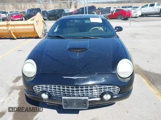2004 Ford Thunderbird Deluxe z VIN 1FAHP60AX4Y103613, wystawiony jako IAAI lot #41962198 z przebiegiem 81 765 mil mil oraz . Historia ofert i sprzedaży dostępna na DreamBid. Obrazek 13.