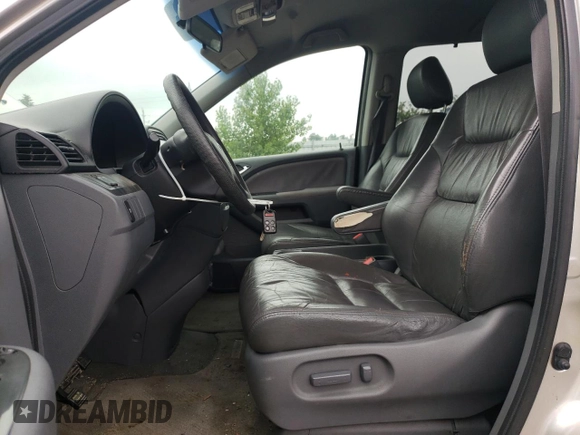 2007 Honda Odyssey EX with VIN 5FNRL38427B513477, listed as a Copart auction lot 62457695 with 216,977 mi miles and Salvage title. Bid and sale history available at DreamBid. Image 7.