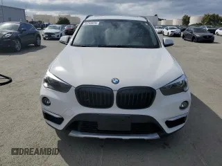 2017 BMW X1 sDrive28i with VIN WBXHU7C39H5H37756, listed as a Copart auction lot 50769975 with 82,479 mi miles and Salvage Title. Bid and sale history available at carsss.com. Image 5.