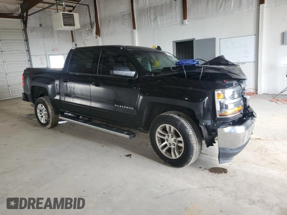 2018 Chevrolet Silverado 1500 LT with VIN 3GCUKREC2JG345482, listed as a Copart auction lot 52452445 with 100,824 mi miles and Salvage Title. Bid and sale history available at DreamBid. Image 4.