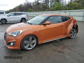 2015 Hyundai Veloster Turbo z VIN KMHTC6AE4FU232986, wystawiony jako Copart lot #55335565 z przebiegiem 127 466 mil mil oraz Szkody całkowita. Historia ofert i sprzedaży dostępna na DreamBid. Obrazek 1.