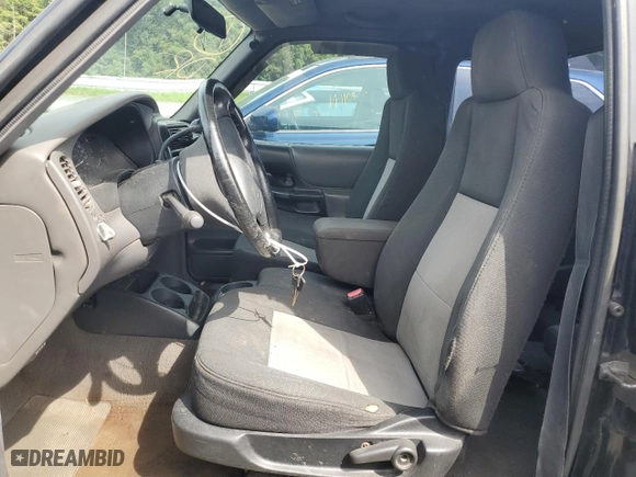 1999 Ford Ranger XL with VIN 1FTYR14X9XTA08323, listed as a Copart auction lot 65949424 with 195,081 mi miles and Salvage Title. Bid and sale history available at carsss.com. Image 7.