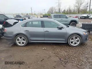 2014 Volkswagen Passat SE с VIN 1VWBN7A39EC085032, выставлен на аукционе IAAI как лот 41931302 с пробегом 193 425 миль миль и . История ставок и продаж доступна на DreamBid. Изображение 13.