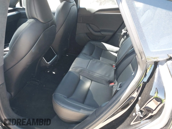 2021 Tesla Model S Plaid with VIN 5YJSA1E66MF452258, listed as a IAAI auction lot 41832000 with 42,845 mi miles and . Bid and sale history available at DreamBid. Image 8.