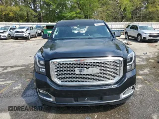2015 GMC Yukon SLT with VIN 1GKS1BKC0FR113013, listed as a Copart auction lot 49821495 with 294,596 mi miles and Salvage Title. Bid and sale history available at carsss.com. Image 5.