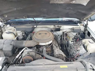 1994 GMC Suburban z VIN 1GKGK26N6RJ771534, wystawiony jako IAAI lot #42359227 z przebiegiem 257 865 mil mil oraz . Historia ofert i sprzedaży dostępna na DreamBid. Obrazek 10.