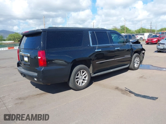 2016 Chevrolet Suburban LT with VIN 1GNSCHKC5GR288312, listed as a IAAI auction lot 41681664 with 195,619 mi miles and . Bid and sale history available at DreamBid. Image 4.