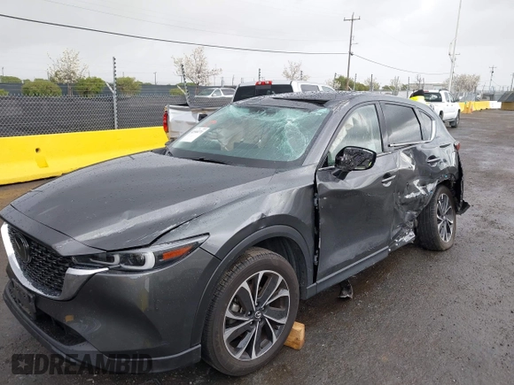 2023 Mazda CX-5 2.5 S Premium Package with VIN JM3KFBDM4P0174901, listed as a IAAI auction lot 41940271 with 25,805 mi miles. Bid and sale history available at carsss.com. Image 6.