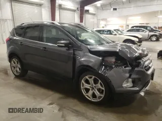 2019 Ford Escape Titanium z VIN 1FMCU9J93KUC54523, wystawiony jako Copart lot #53613665 z przebiegiem 140 895 mil mil oraz Szkoda całkowita • Salvage title. Historia ofert i sprzedaży dostępna na DreamBid. Obrazek 4.