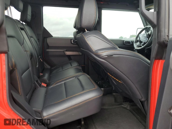 2023 Ford Bronco z VIN 1FMEE5DP4PLB13904, wystawiony jako Copart lot #56490175 z przebiegiem 29 141 mil mil oraz Szkoda całkowita • Salvage title. Historia ofert i sprzedaży dostępna na DreamBid. Obrazek 11.