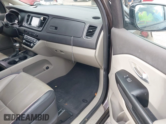 2018 Kia Sedona LX with VIN KNDMB5C15J6382599, listed as a IAAI auction lot 41964769 with 82,494 mi miles. Bid and sale history available at carsss.com. Image 5.