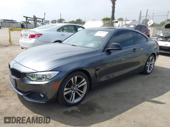 2014 BMW 4 Series 428i with VIN WBA3N7C5XEF718428, listed as a IAAI auction lot 42043910 with 157,686 mi miles and . Bid and sale history available at DreamBid. Image 2.