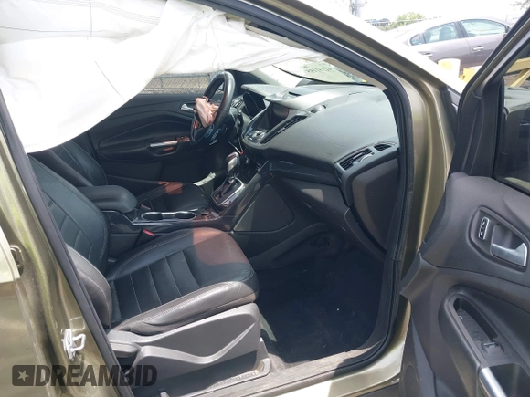 2014 Ford Escape Titanium с VIN 1FMCU0J93EUA92621, выставлен на аукционе IAAI как лот 42531195 с пробегом 170 423 миль миль и . История ставок и продаж доступна на DreamBid. Изображение 5.