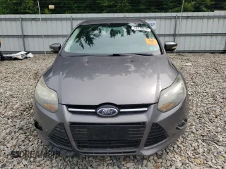 2014 Ford Focus Titanium z VIN 1FADP3N23EL365678, wystawiony jako Copart lot #64418025 z przebiegiem Nie podano mil oraz Czysty tytuł • Clean title. Historia ofert i sprzedaży dostępna na DreamBid. Obrazek 5.