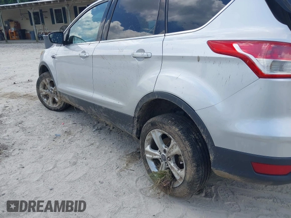 2014 Ford Escape SE with VIN 1FMCU9G9XEUD91390, listed as a IAAI auction lot 42561849 with 319,400 mi miles and . Bid and sale history available at DreamBid. Image 3.