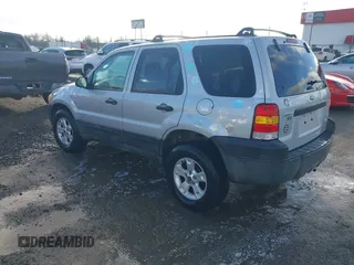 2007 Ford Escape XLT with VIN 1FMYU03Z37KA92572, listed as a IAAI auction lot 41213281 with 129,366 mi miles. Bid and sale history available at carsss.com. Image 3.