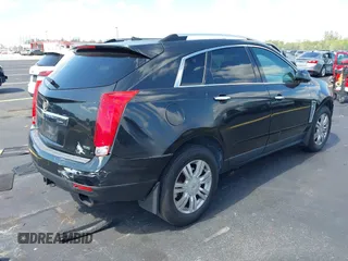 2013 Cadillac SRX Premium Collection with VIN 3GYFNEE34DS535613, listed as a IAAI auction lot 42336365 with 106,426 mi miles and . Bid and sale history available at DreamBid. Image 4.