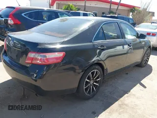 2008 Toyota Camry LE z VIN 4T4BE46KX8R023995, wystawiony jako IAAI lot #41837407 z przebiegiem 197 425 mil mil oraz . Historia ofert i sprzedaży dostępna na DreamBid. Obrazek 4.