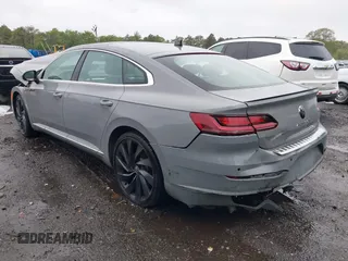2023 Volkswagen Arteon SEL R-Line z VIN WVWAR7ANXPE010870, wystawiony jako IAAI lot #42246798 z przebiegiem 26 587 mil mil oraz . Historia ofert i sprzedaży dostępna na DreamBid. Obrazek 3.