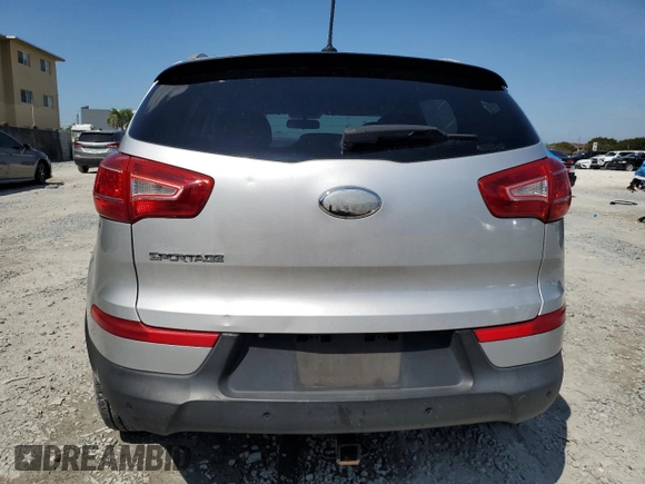 2013 Kia Sportage LX with VIN KNDPB3A26D7429389, listed as a Copart auction lot 50597295 with 217,197 mi miles and Salvage Title. Bid and sale history available at carsss.com. Image 6.