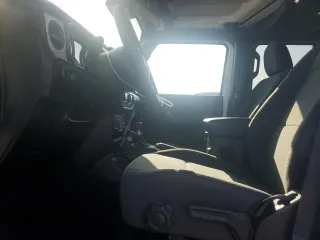 2024 Jeep Wrangler Sport S with VIN 1C4PJXDN6RW297070, listed as a Copart auction lot 56965465 with 21,872 mi miles and Salvage title. Bid and sale history available at DreamBid. Image 7.