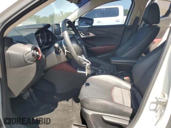 2017 Mazda CX-3 Touring z VIN JM1DKDC75H0168823, wystawiony jako Copart lot #57968955 z przebiegiem 116 231 mil mil oraz Szkoda całkowita • Salvage title. Historia ofert i sprzedaży dostępna na DreamBid. Obrazek 7.