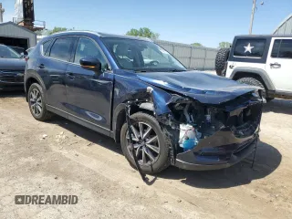 2018 Mazda CX-5 Grand Touring with VIN JM3KFADM7J0377315, listed as a Copart auction lot 53335185 with 68,462 mi miles and Salvage title. Bid and sale history available at DreamBid. Image 4.