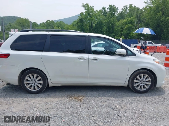 2015 Toyota Sienna XLE with VIN 5TDYK3DC3FS586329, listed as a IAAI auction lot 42496805 with 132,828 mi miles and . Bid and sale history available at DreamBid. Image 13.